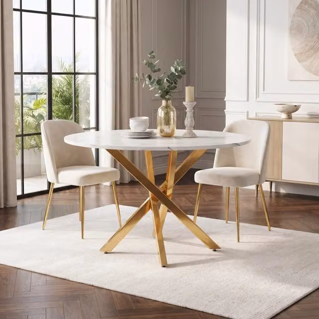 Tavolo da pranzo rotondo OKWISH con piano effetto marmo bianco lucido e gambe incrociate dorate in MDF e metallo per cucina e soggiorno