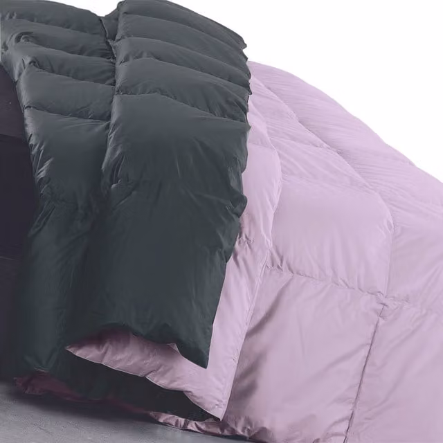 Trapunta in piuma bicolore Sakura DaunenStep multicolore blu, traspirante e anallergica