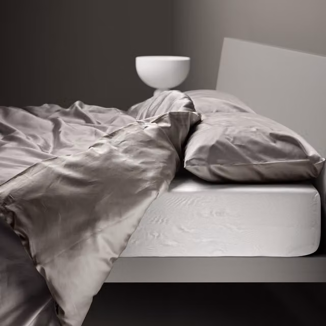 Copripiumino reversibile DaunenStep Oasi Kiss in cotone Mako Satin grigio con chiusura a zip