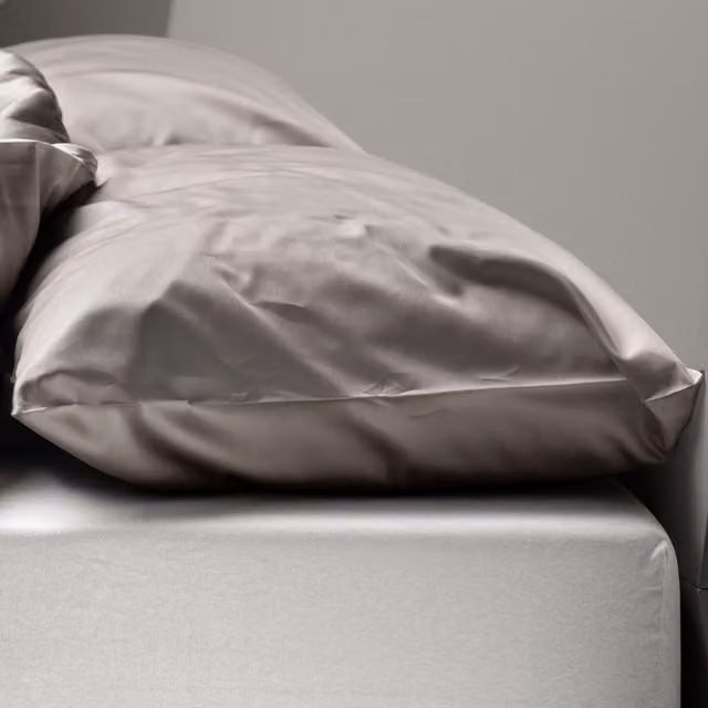 Federa copricuscino reversibile DaunenStep Oasi Kiss in cotone mako satin grigio