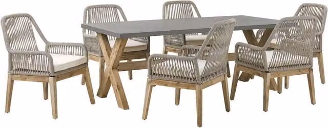 Set da pranzo da giardino Beliani con tavolo rettangolare in cemento e 6 sedie in legno di acacia color grigio e beige dal design moderno