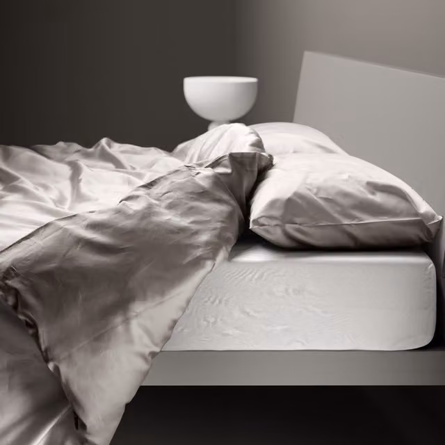 Copripiumino reversibile DaunenStep Oasi Kiss in cotone Mako Satin grigio con chiusura a zip